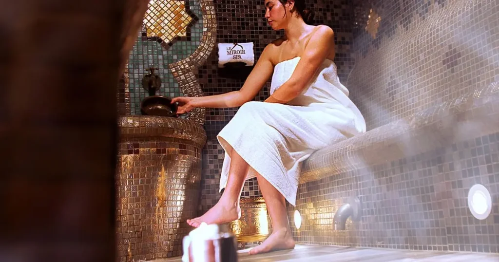 Best hammams in Marrakech luxury riad spa interior with arched ceilings and candlelight