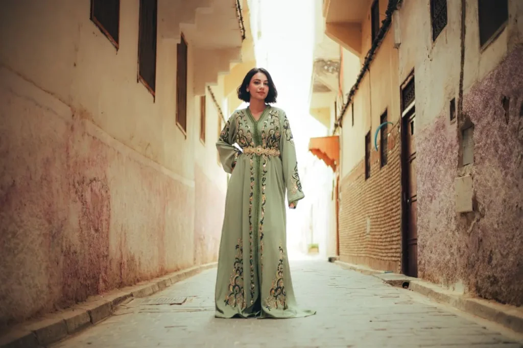 Traditional Moroccan clothing including a djellaba and embroidered kaftan