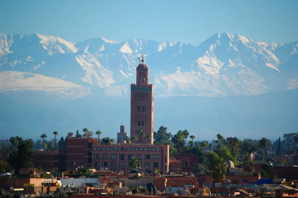 Life in Morocco 2026 โ sunset view over Marrakech medina and Atlas Mountains