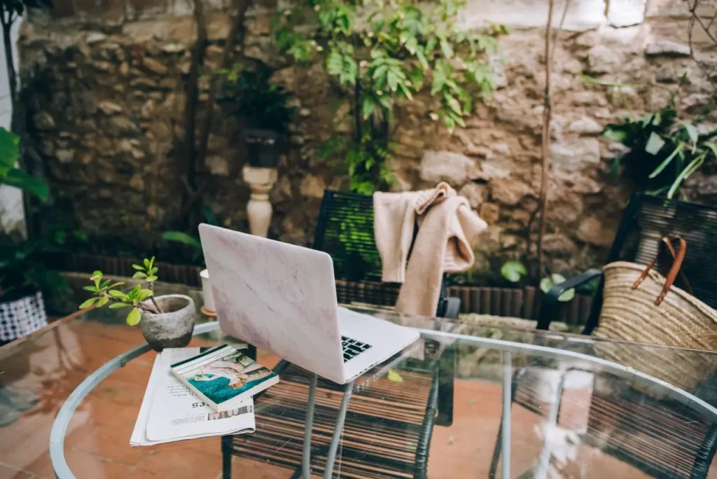 Internet speeds for remote work in Morocco โ laptop setup in a riad courtyard